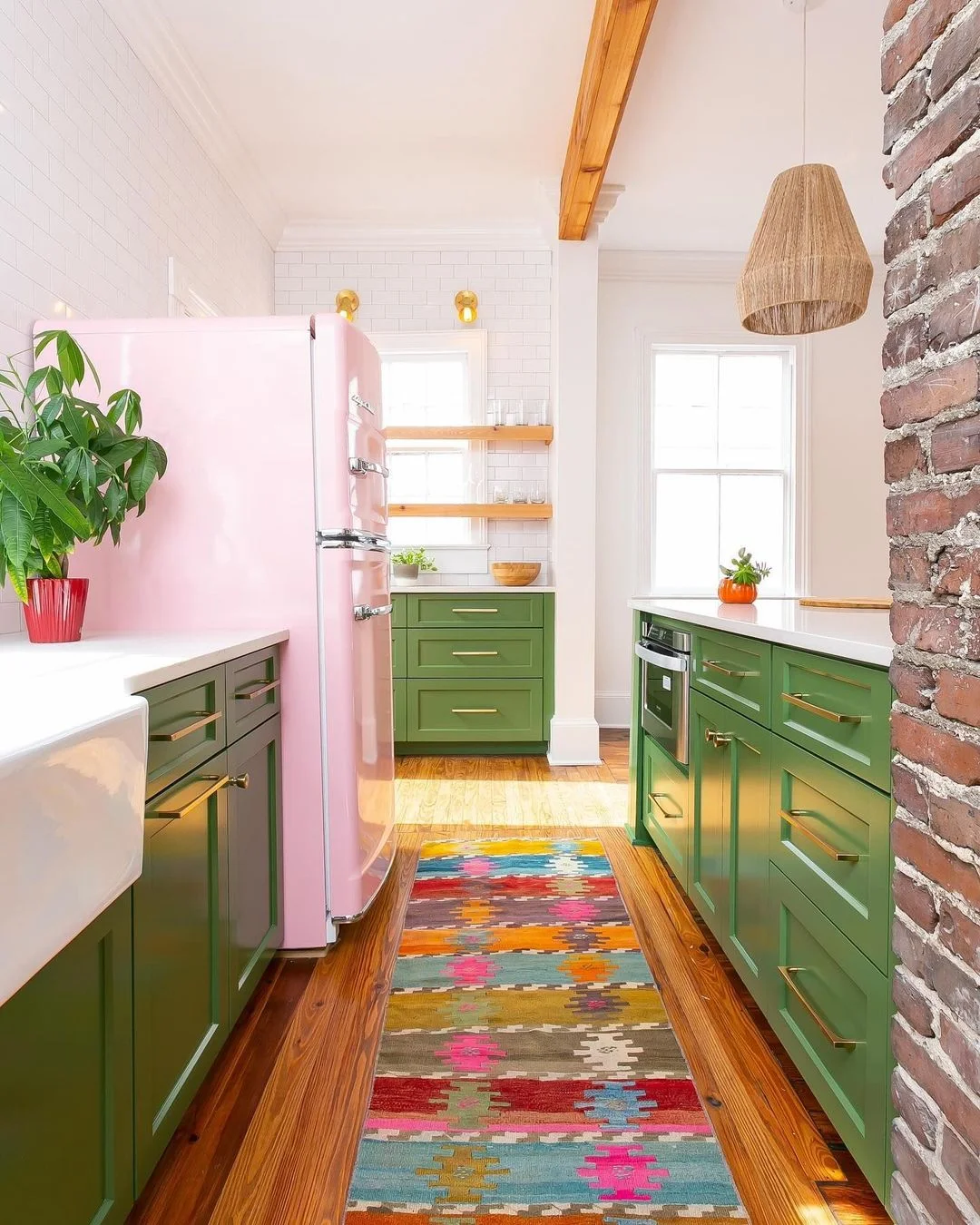 Pastel Pink Fridge Meets Bold Green Cabinets for a Fun Contrast