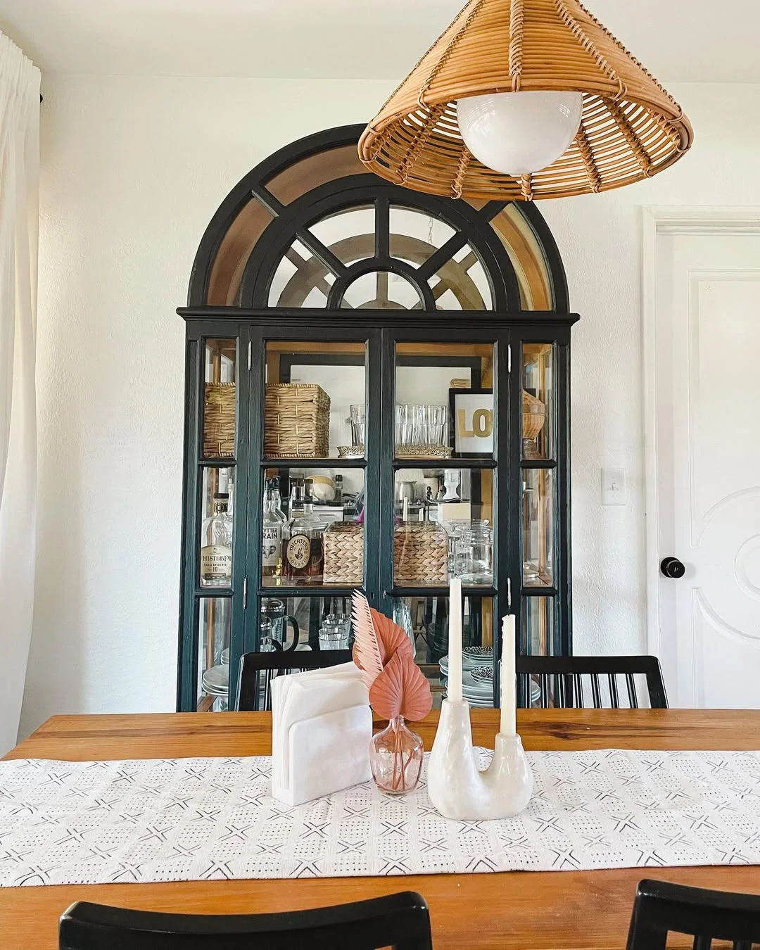 Black Arched Display Cabinet in Dining Room