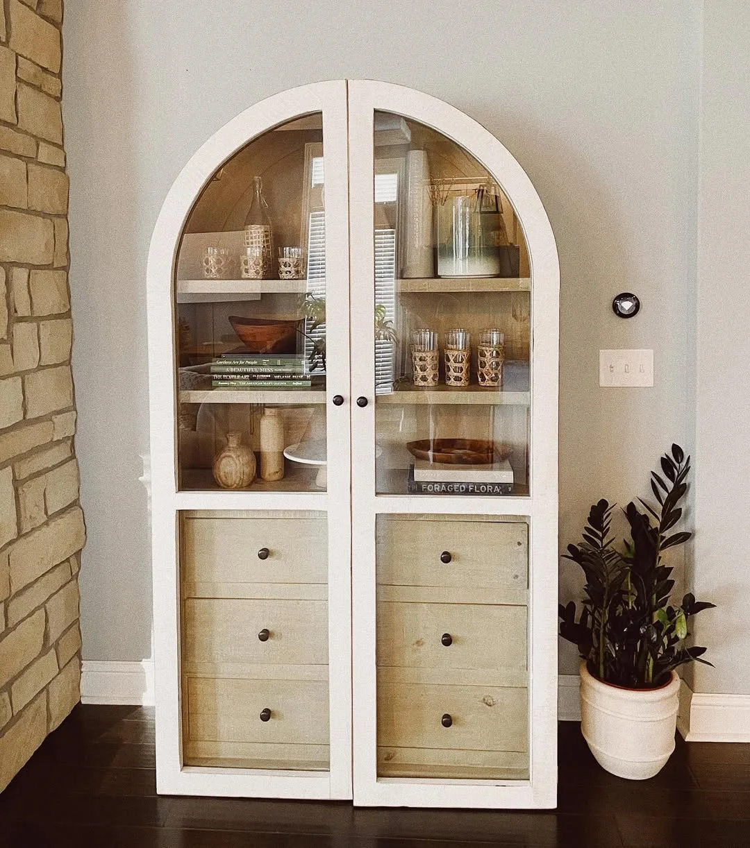 White Arched Cabinet with Natural Wood Accents