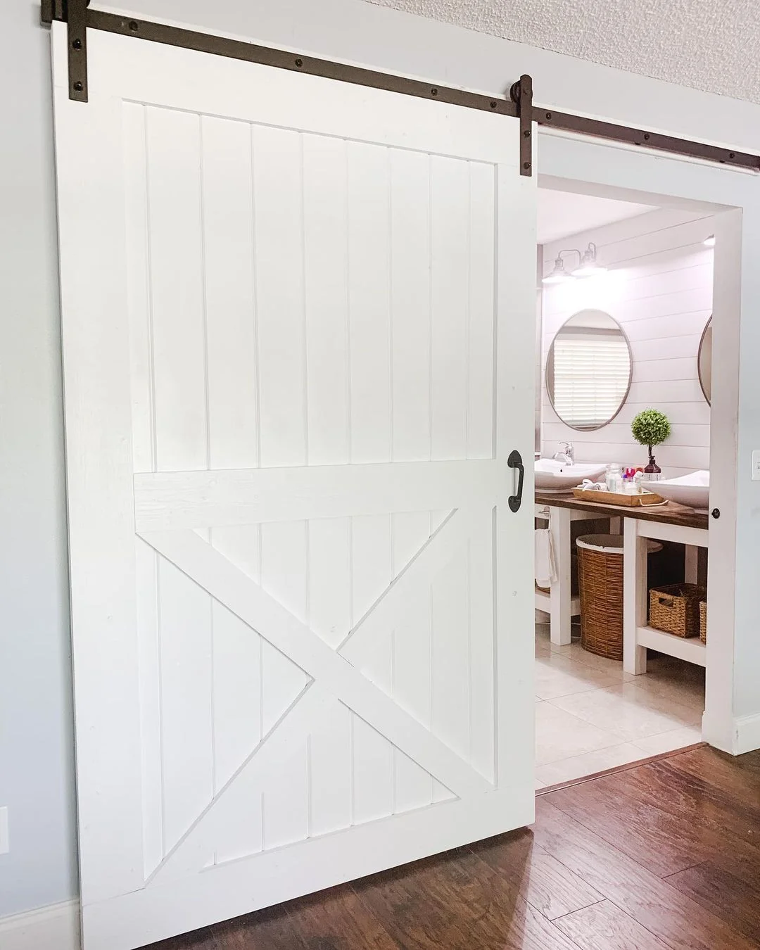 White Barn Door Bathroom Entrance