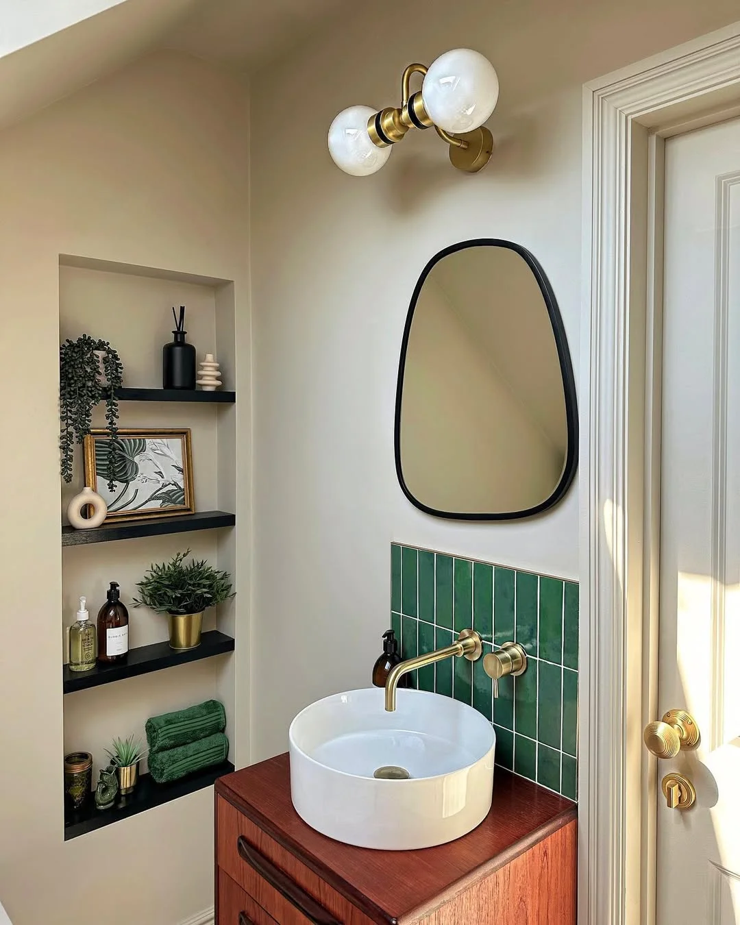 Mid-Century Modern Bathroom Lighting with Brass Accents