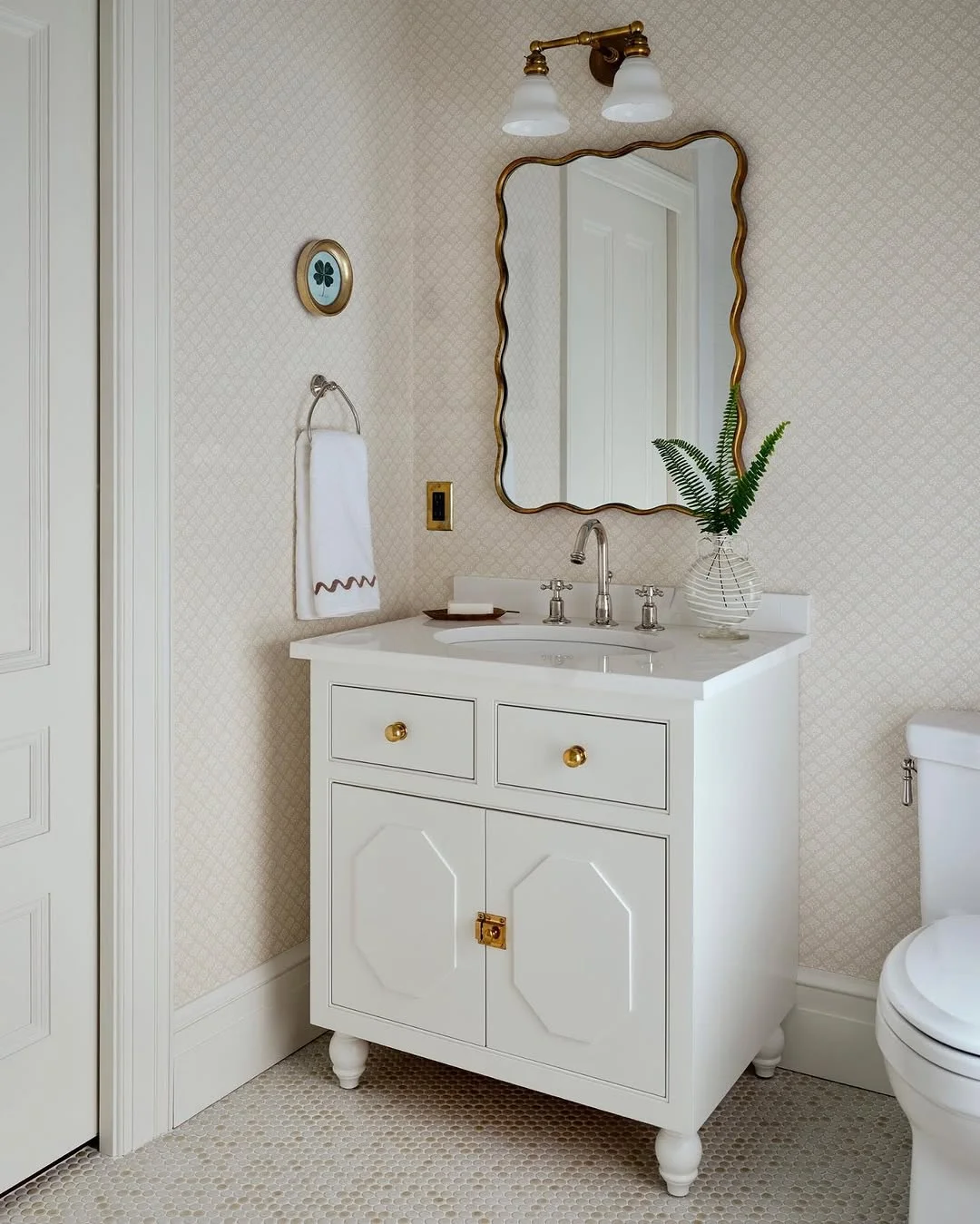 Charming Powder Room Lighting with Scalloped Mirror