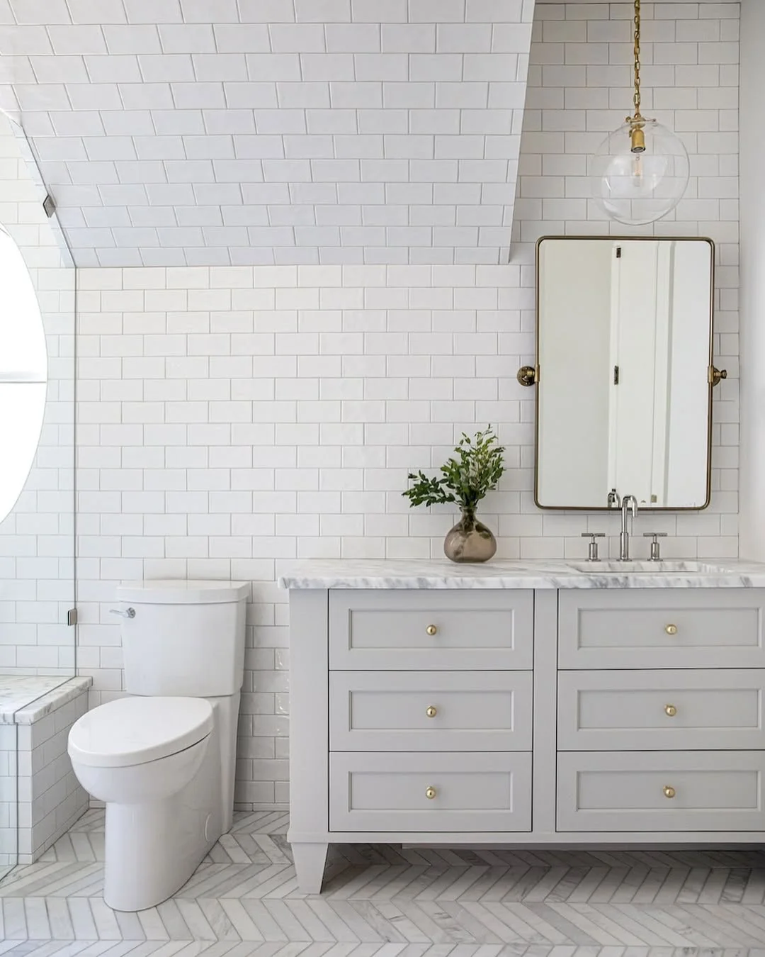 Bright Bathroom with Subway Tile and Pendant Lighting