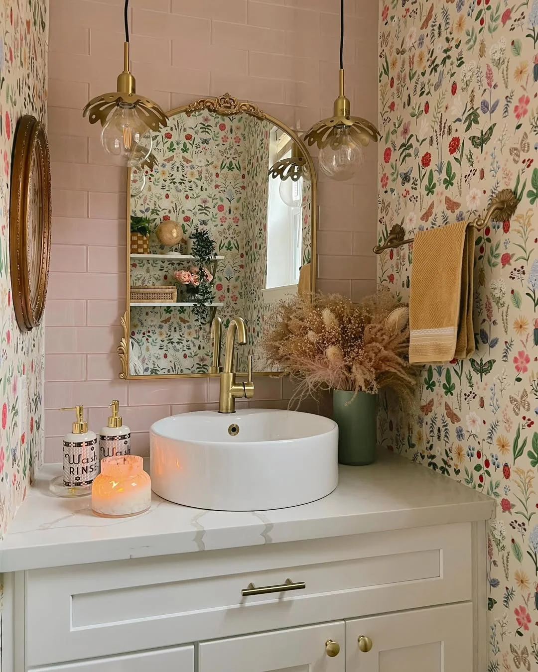 Charming Floral Bathroom with Ornate Mirror