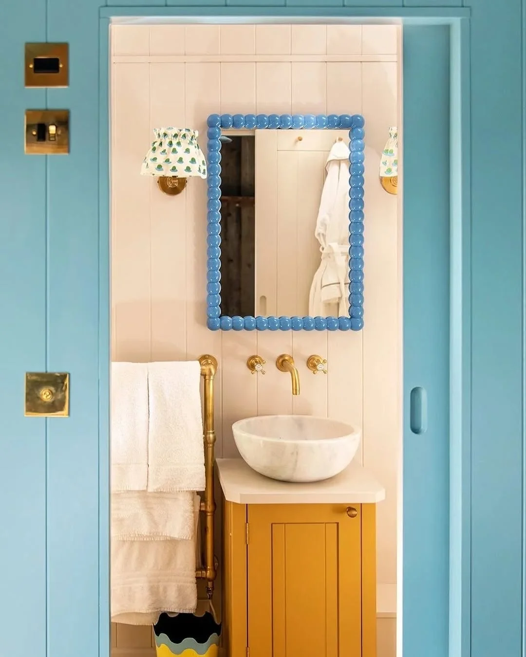 Colorful Bathroom with Beaded Mirror