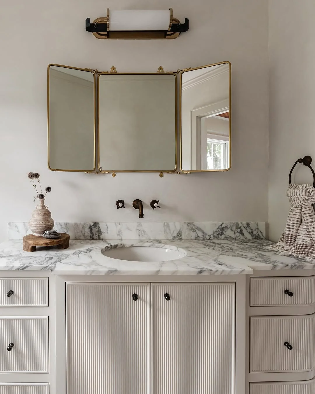 Minimalist Bathroom with Triptych Mirror