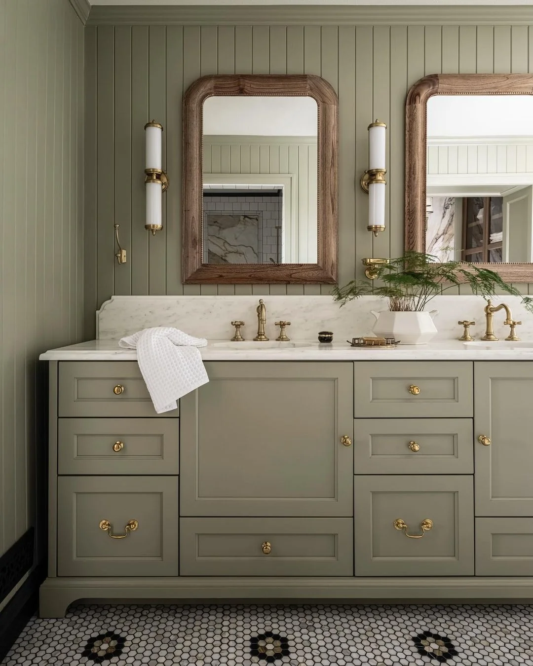 Elegant Green Bathroom with Double Mirrors