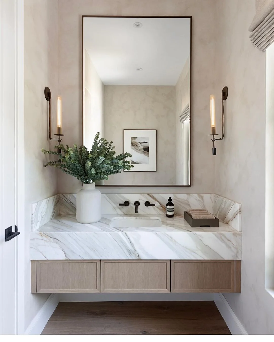 Sleek Sophistication in a Marble Clad Bathroom