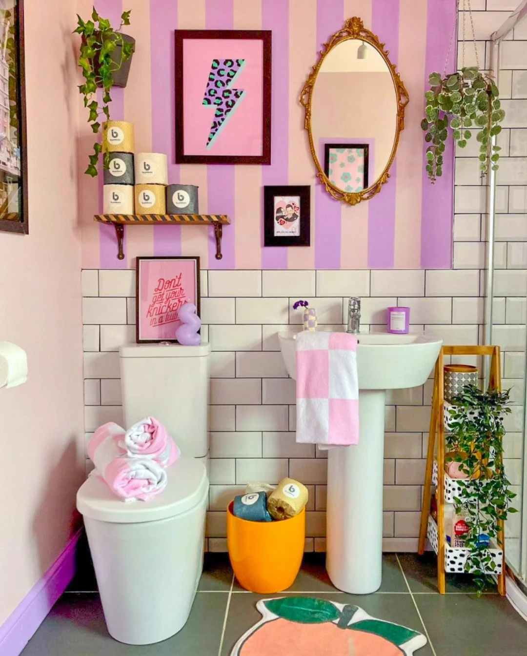 Bold Stripes and Fun Art for a Vibrant Bathroom