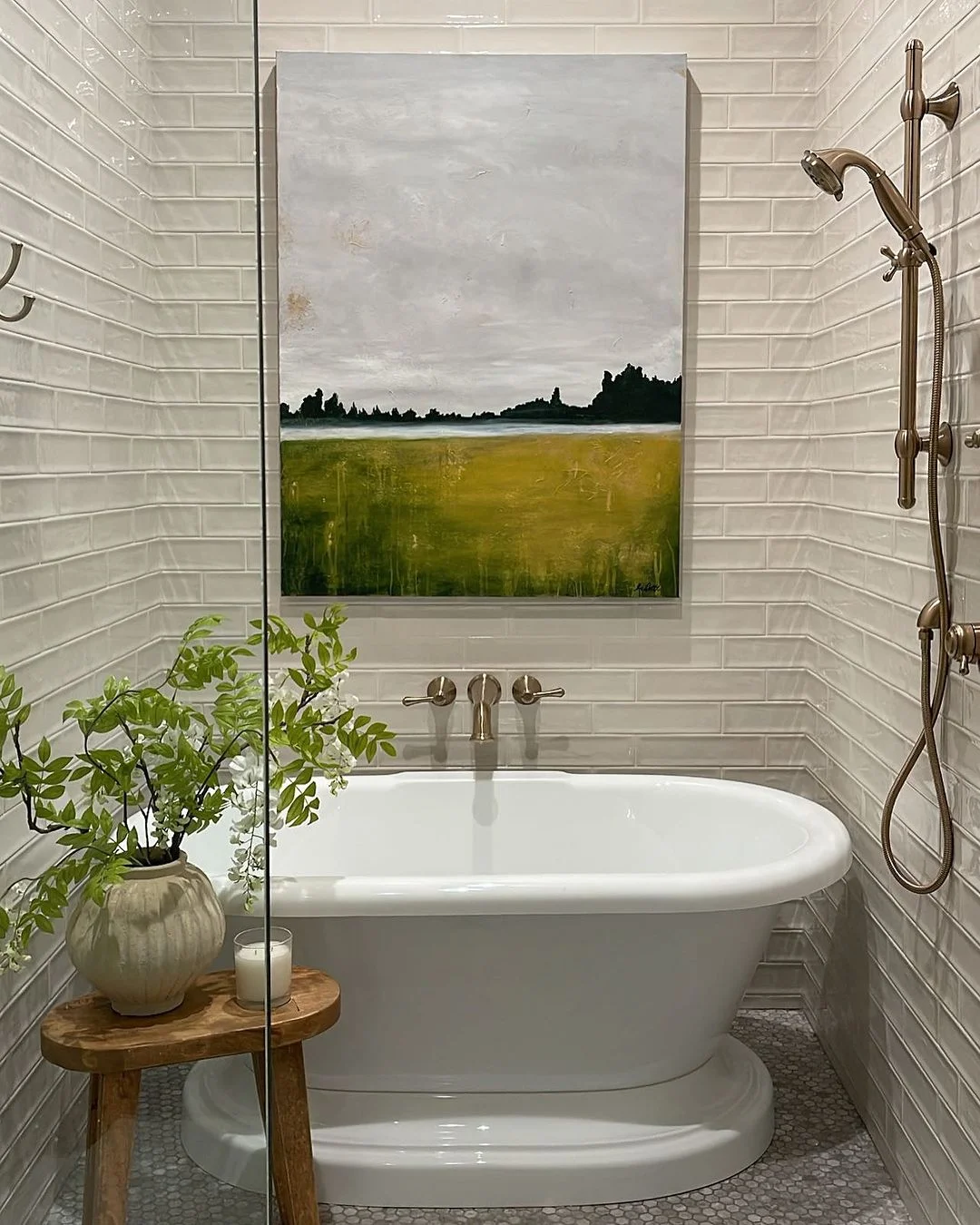 Minimalist Landscape Art and Natural Accents for a Tranquil Bathroom