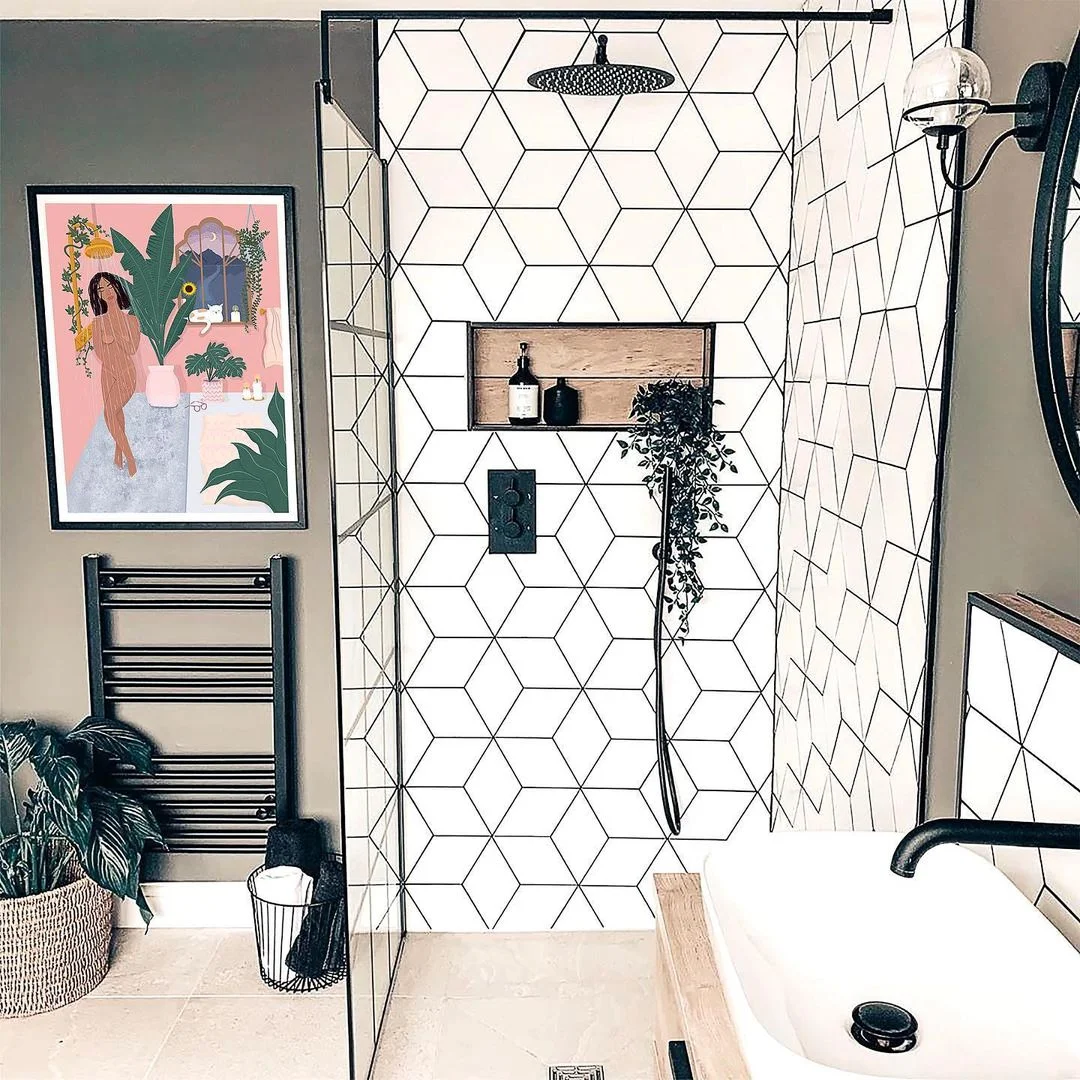 Geometric Tiles and Vibrant Art for a Modern Bathroom