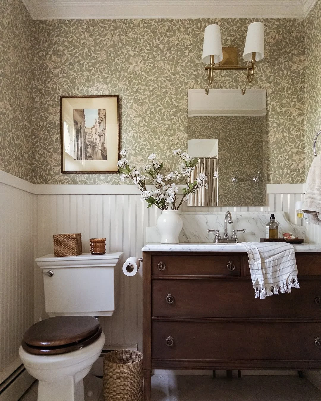 Classic Bathroom with Botanical Wallpaper and Dark Wood Vanity