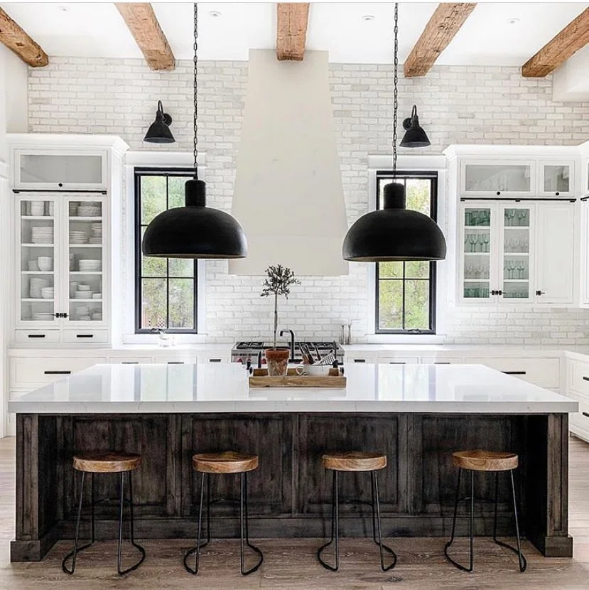 Lofty Feel with Whitewashed Brick and Wood Beams