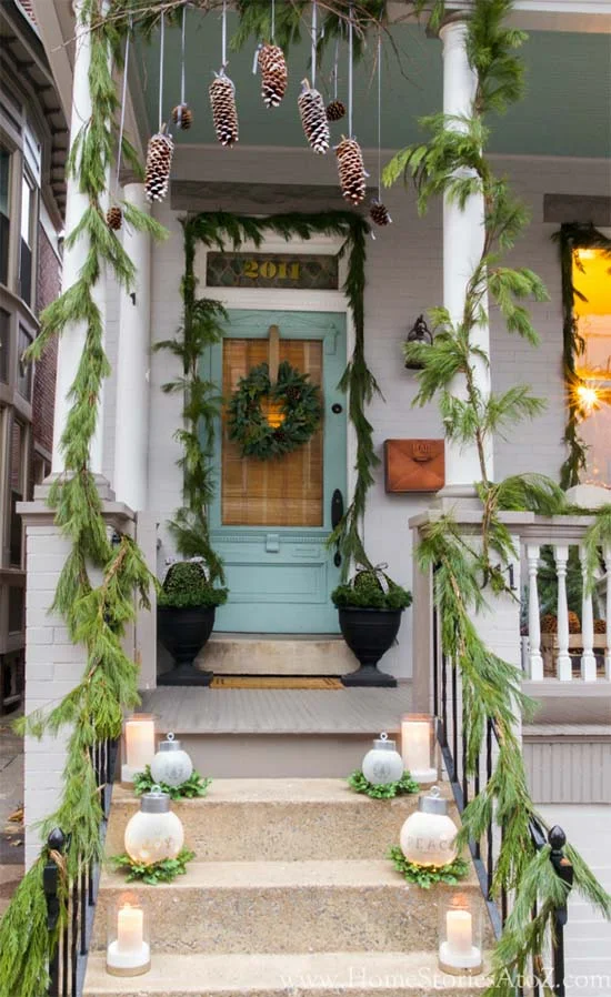 Embellish Porch with Festive Garlands and Pinecones Accents