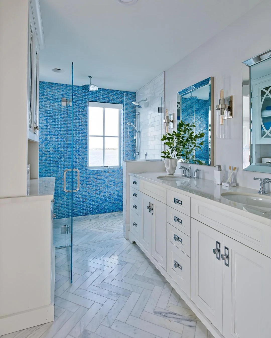 Airy Coastal Bathroom with Mosaic Tile Shower