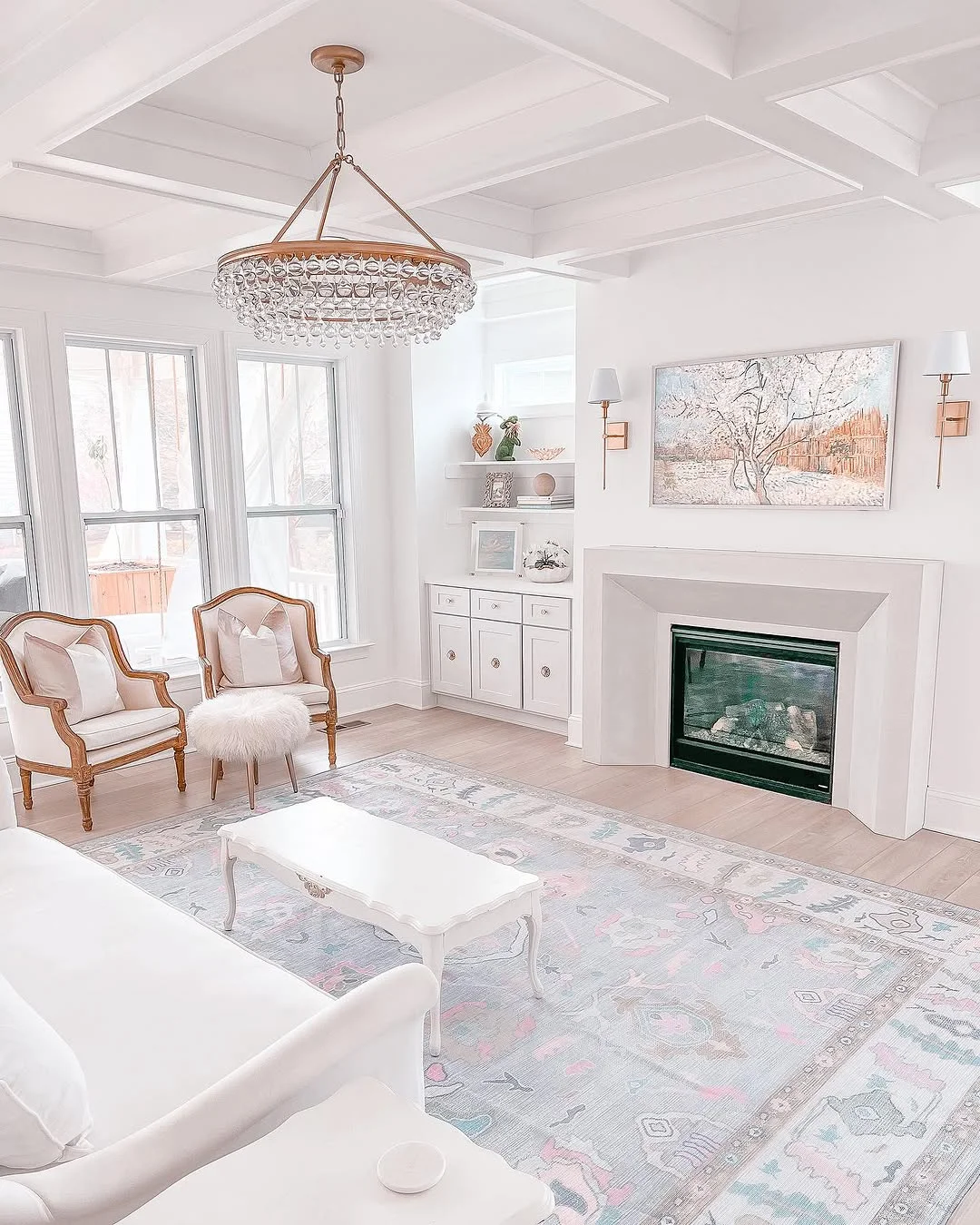 All-White Living Room with Coffered Ceiling and Pastel Accents