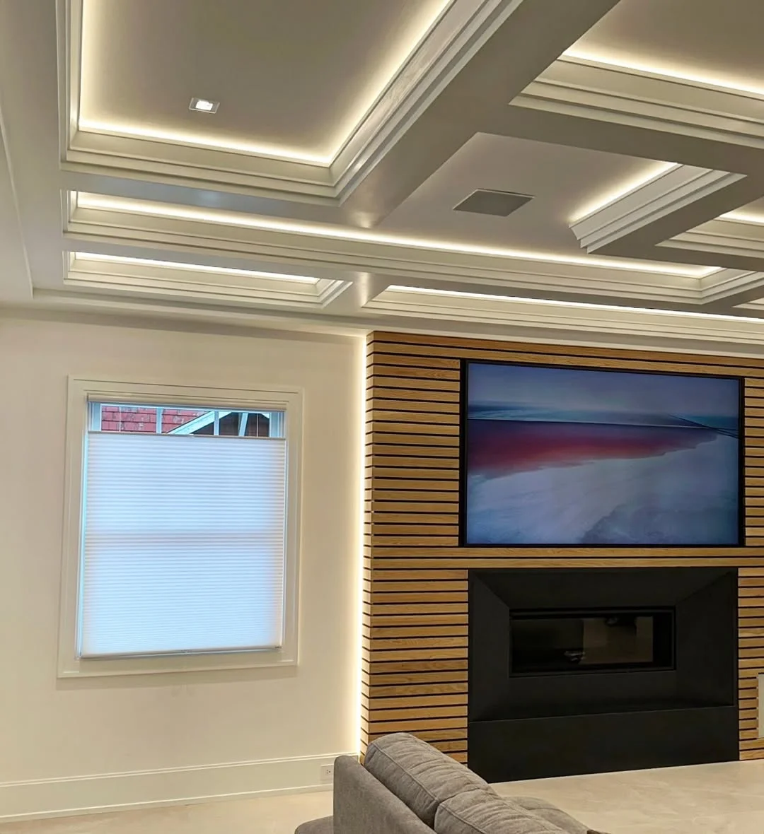 Modern Living Room with Coffered Ceiling and LED Lighting