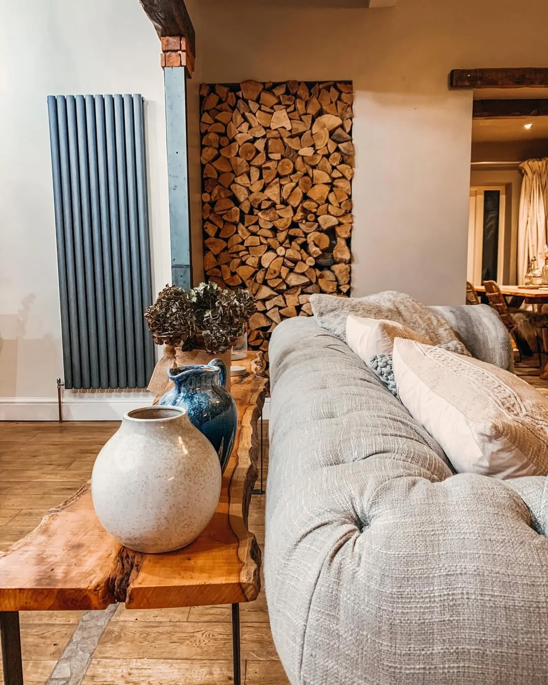 Cozy Cottage Living Room with Log Feature Wall