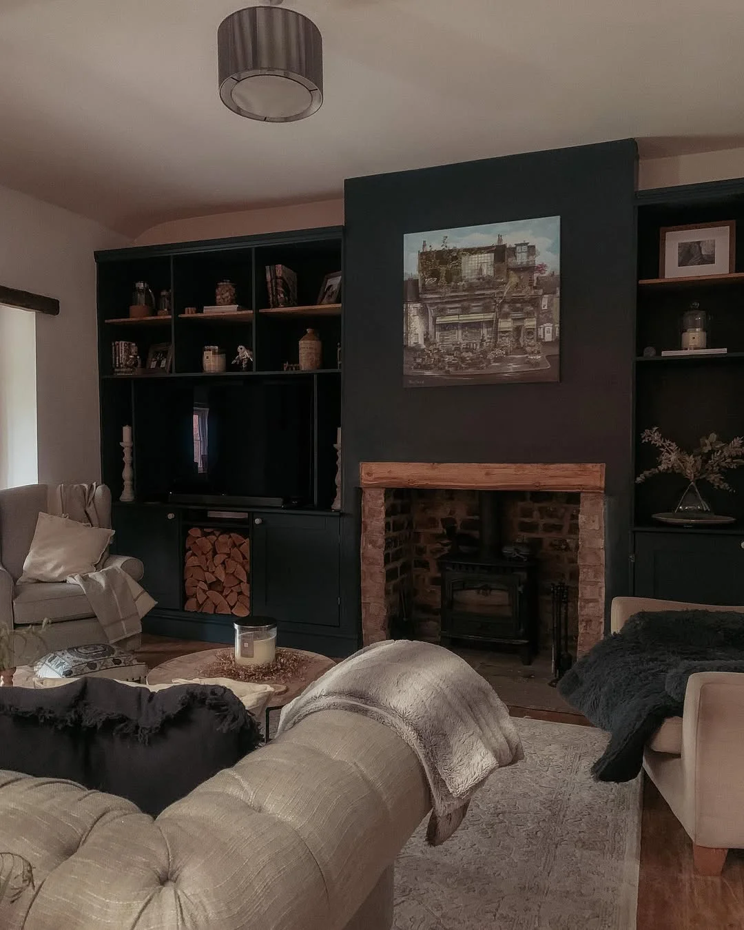 Moody Cottage Living Room with Dark Built-Ins