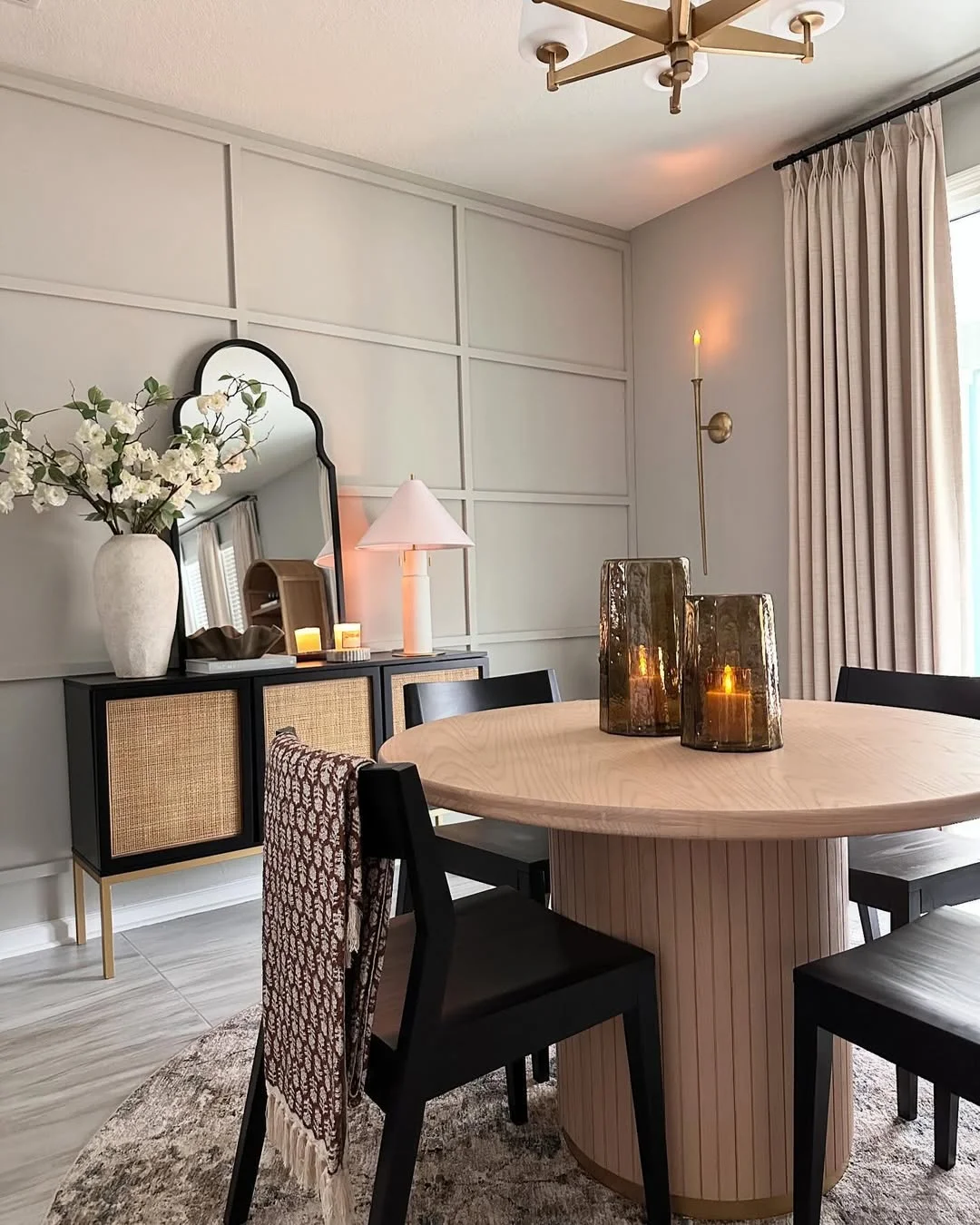 Modern Dining Room with Arched Mirror and Box Molding