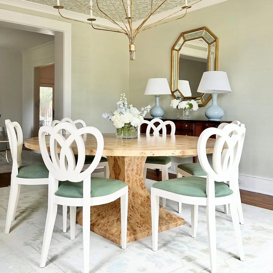 Elegant Dining Room with Burl Wood Table and Octagon Mirror