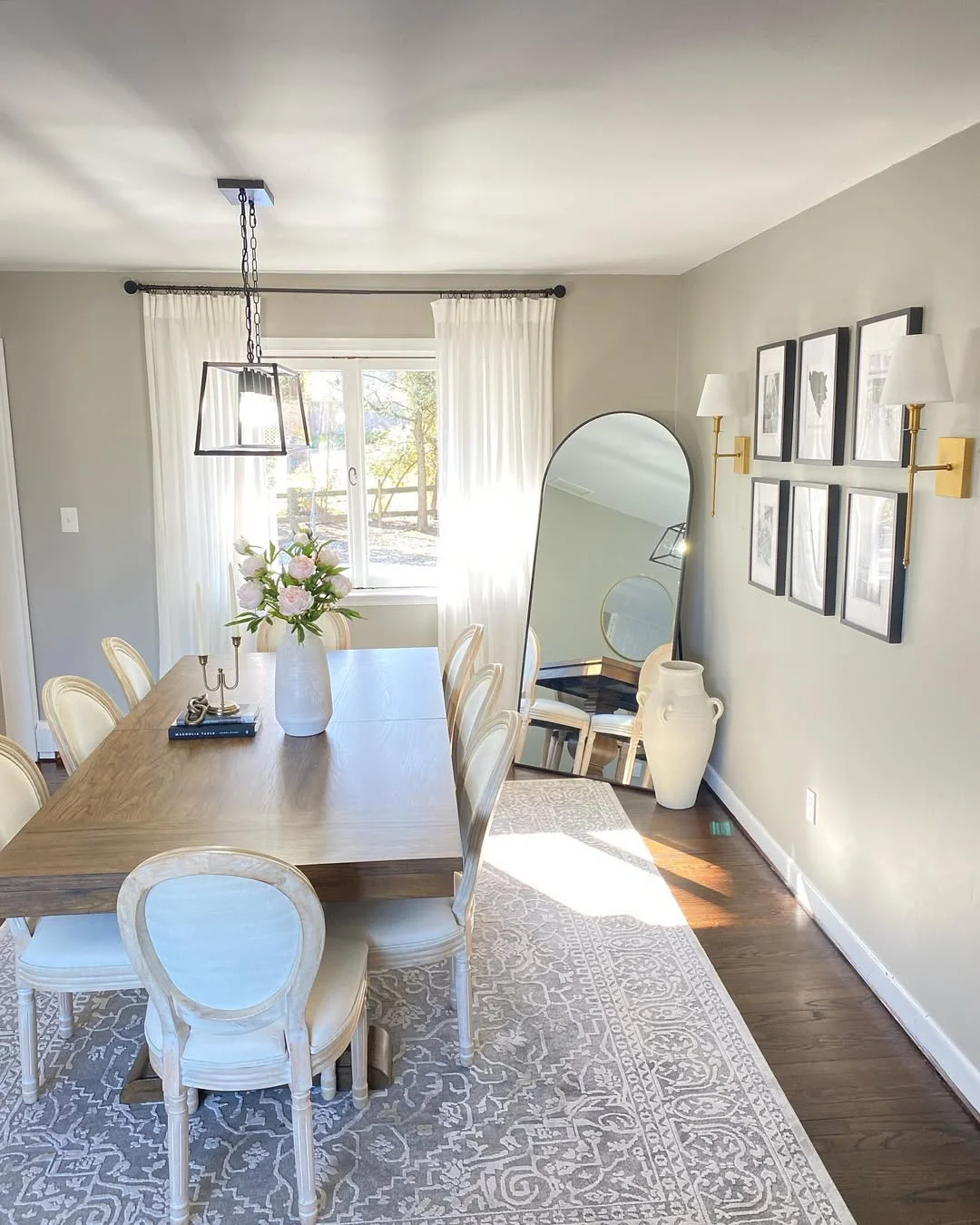 Traditional Dining Room with Arched Floor Mirror