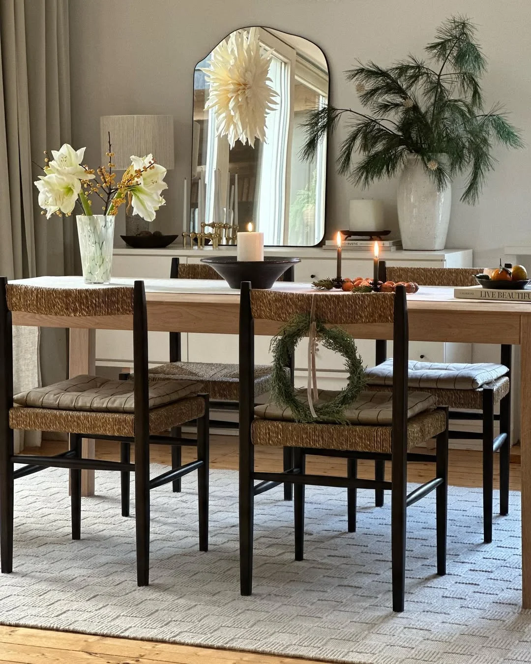 Minimalist Dining Room with Arched Top Mirror