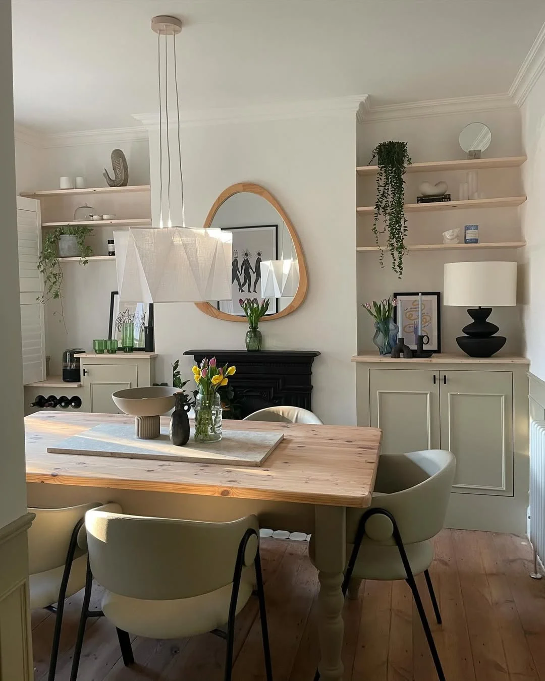 Modern Eclectic Dining Room with Organic Mirror