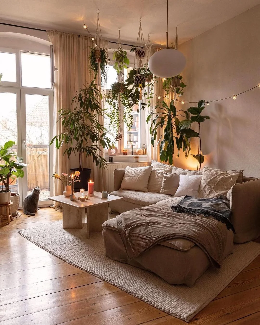 Cozy Plant-Filled Living Room with Warm Lighting