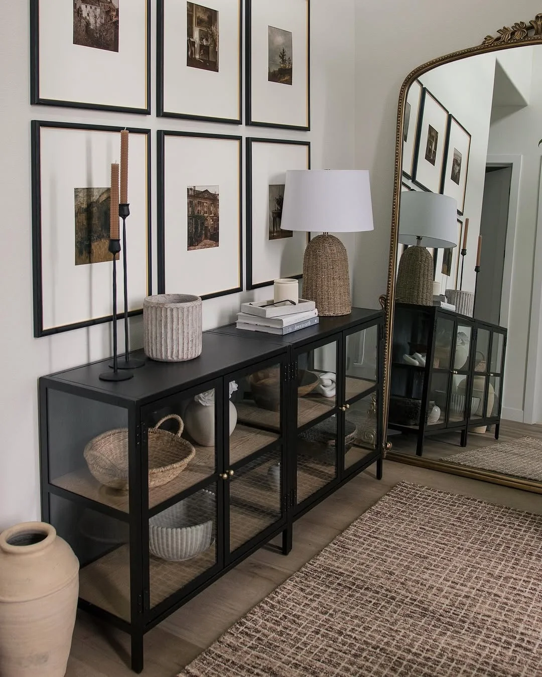 Chic Entryway with Textured Rug and Gallery Wall