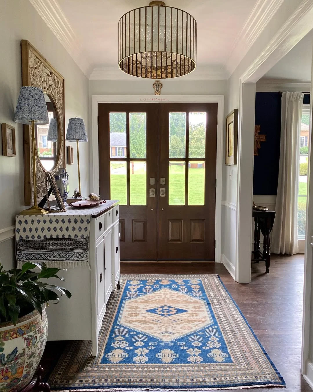 Traditional Entryway with Blue and Beige Rug