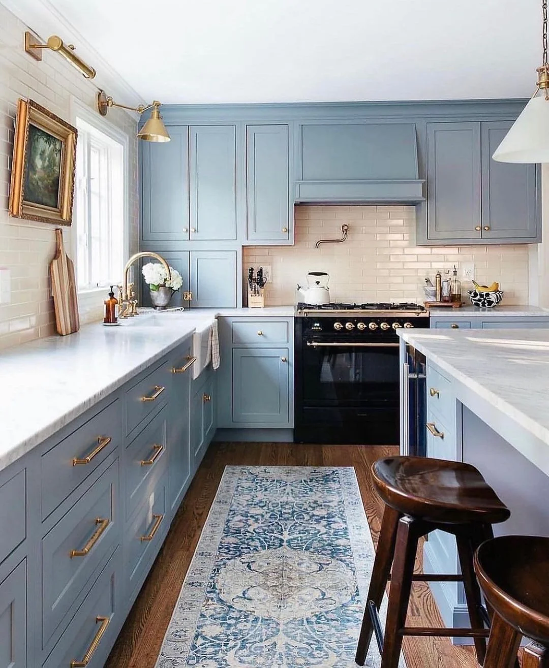 Traditional Rug with Blue Cabinets