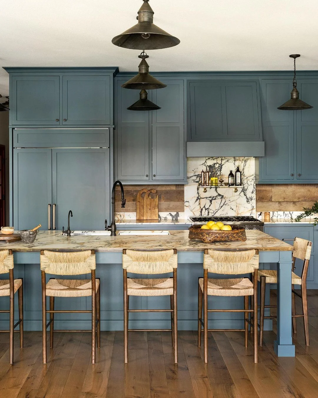 Blue Cabinets, Wood Backsplash, &amp; Marble Counters