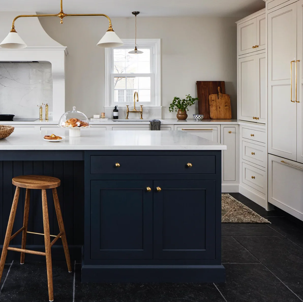 Classic Blue &amp; White Cabinets with Bold Black Floors