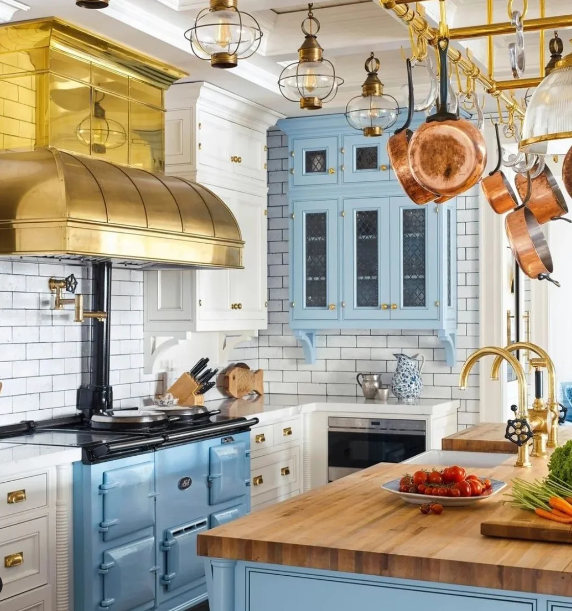 Industrial Flair: Baby Blue Cabinets with Gold Vent