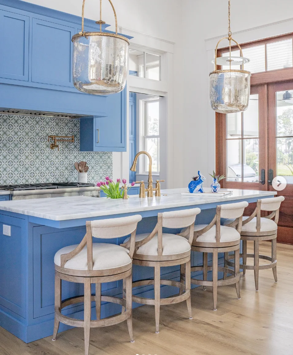 Bright Blue Cabinets with Floral Tile Splash