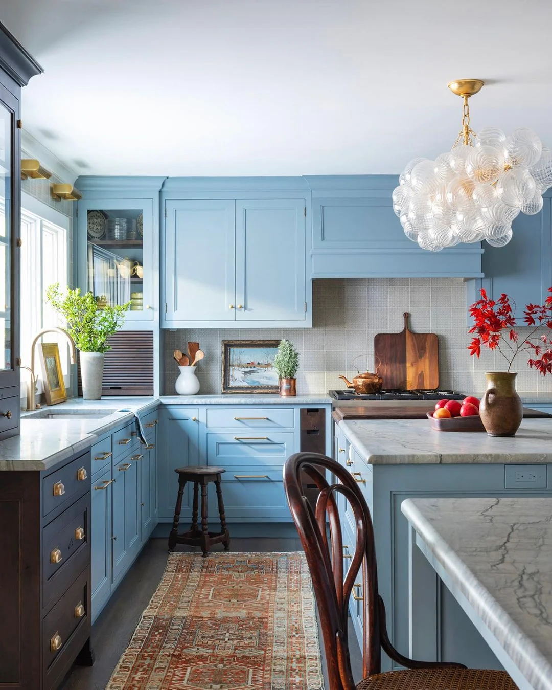 Dark Blue Vent, Steel Appliances, &amp; Brick Walls