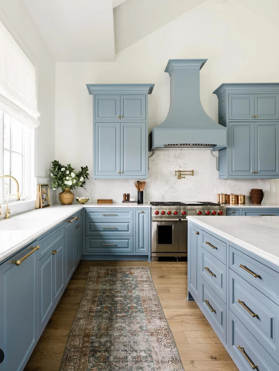 Light Blue Cabinets, Wood Floors &amp; Cozy Rug