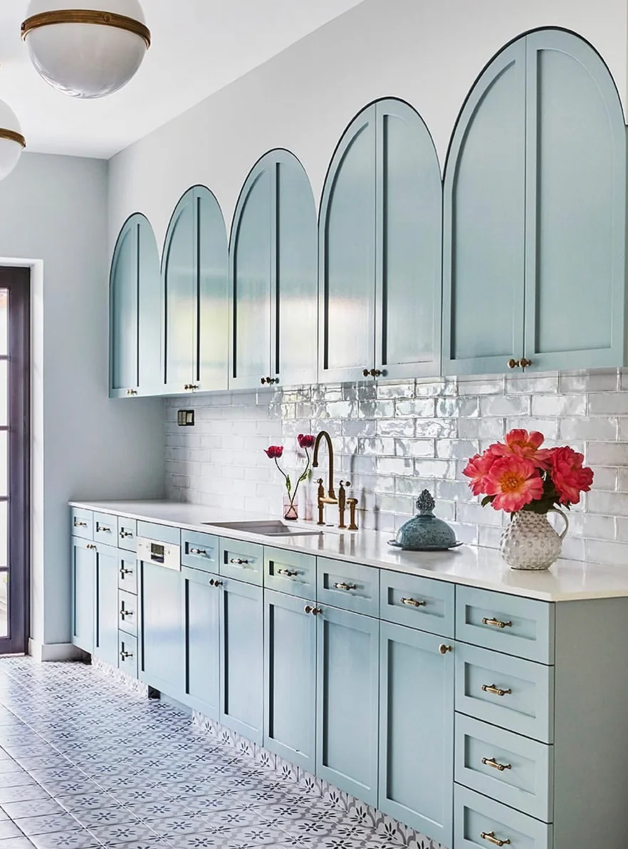 Soft Blue Cabinets with an Arch Twist