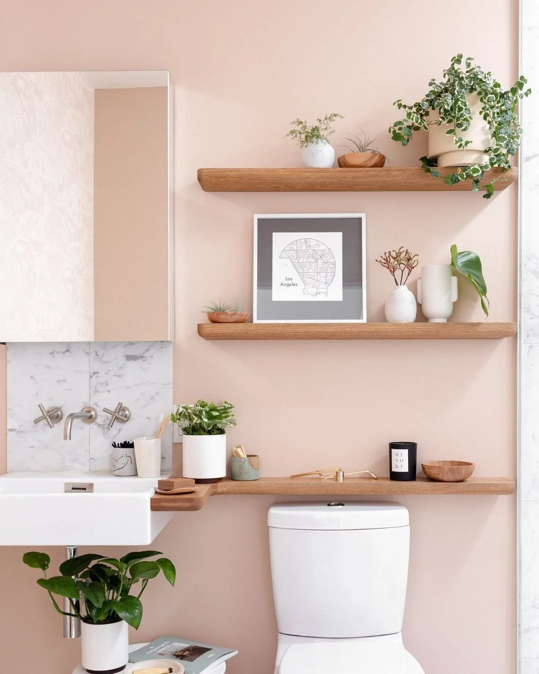 Blush Pink Bathroom with Wooden Shelves