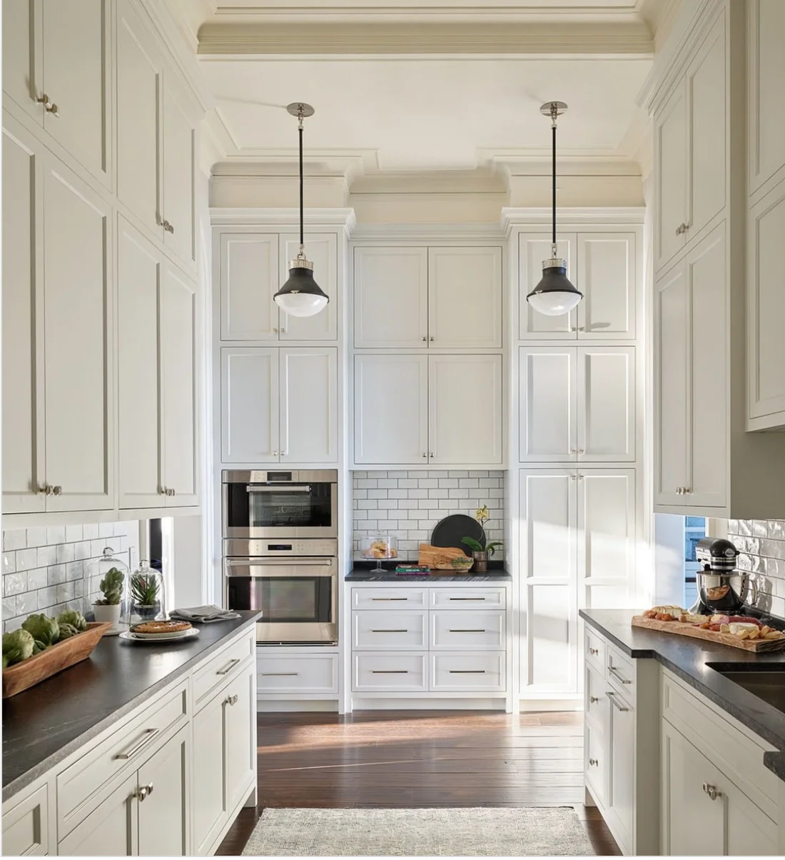 Off-White Kitchen with Eye-Catching Light Fixtures