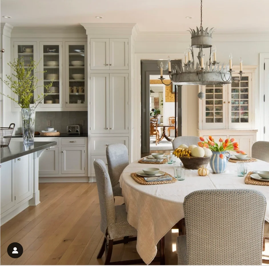 Dining Room’s Tall Glass-Fronted Cabinetry