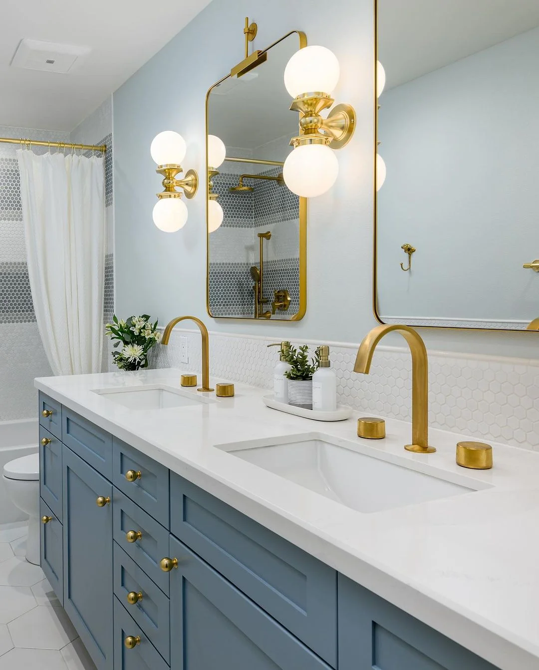 Chic Blue and Gold Bathroom