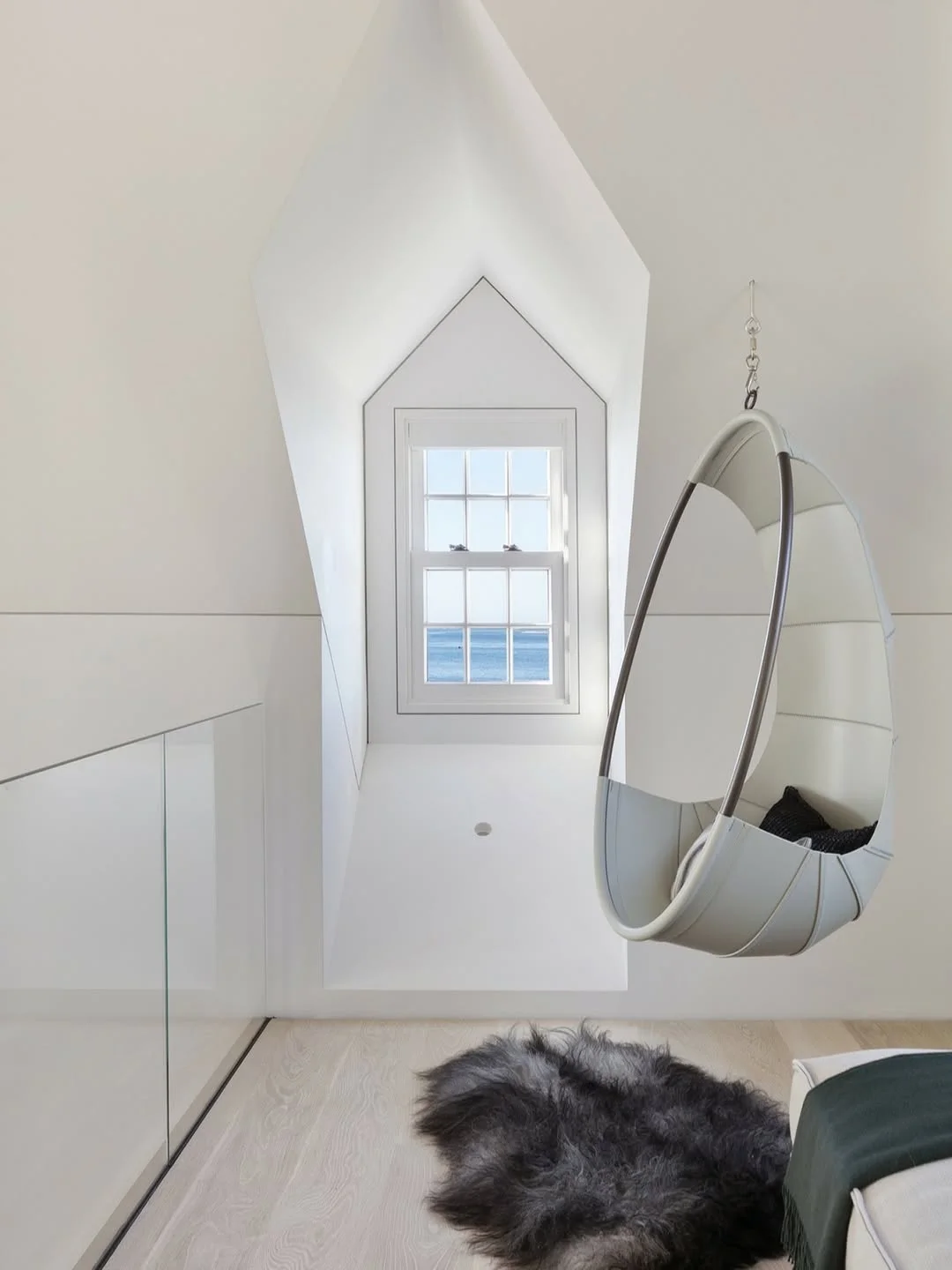 Minimalist Hanging Chair with Ocean View