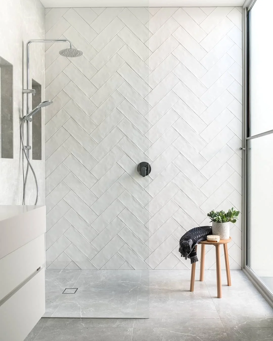 Minimalist White Herringbone Bathroom