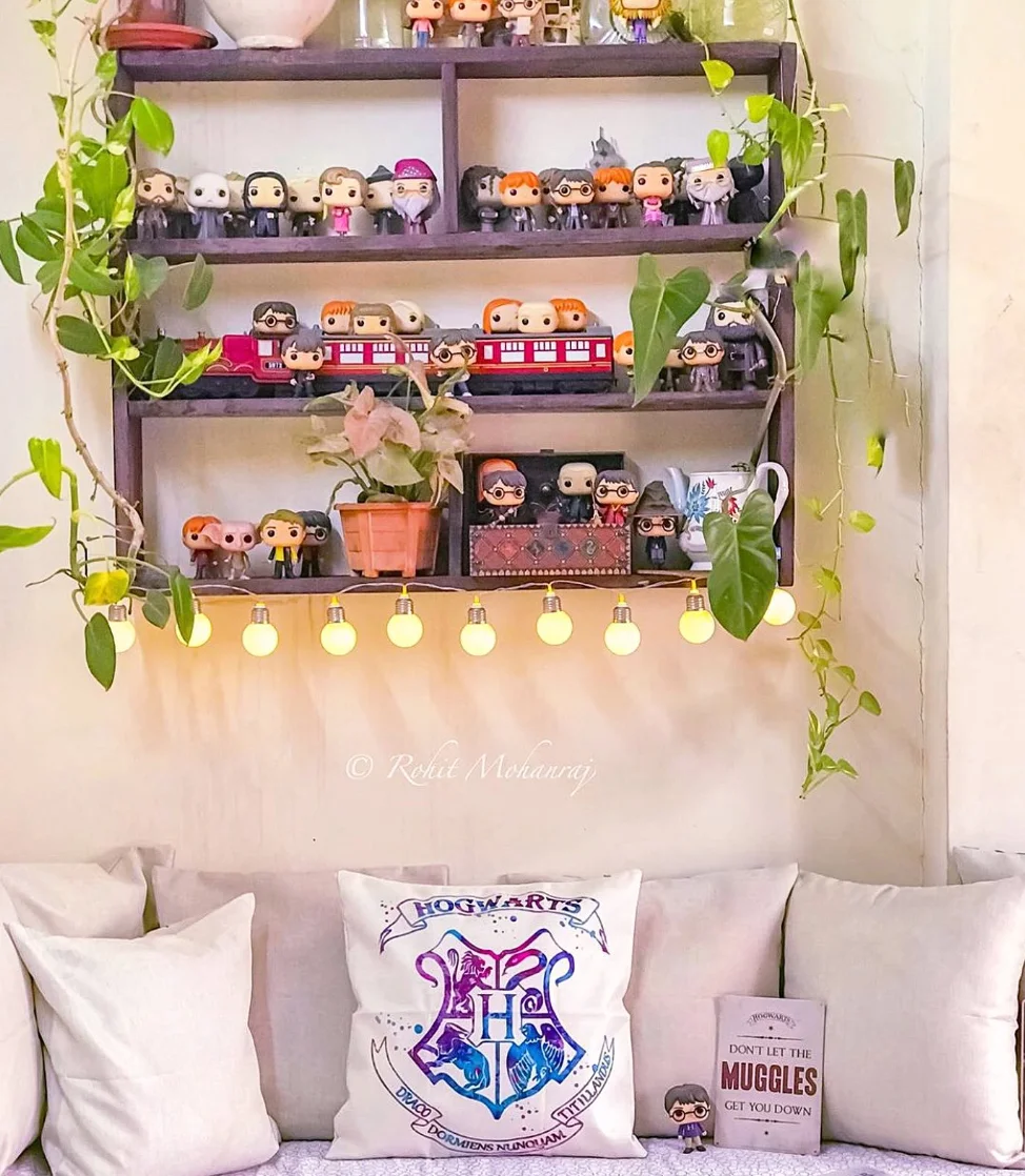 Floating Shelf for Harry Potter Collectibles Behind the Couch