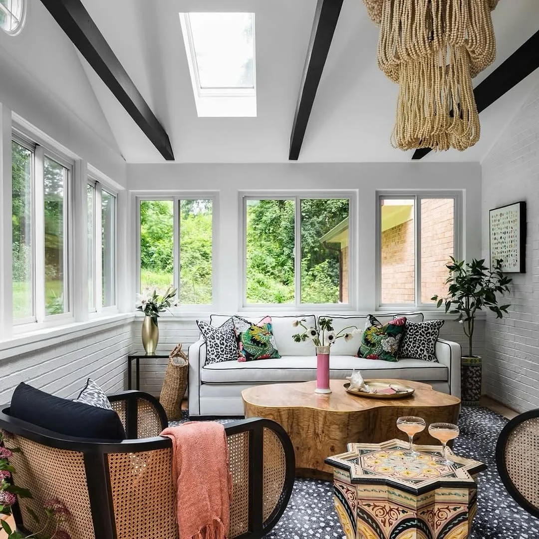 Bohemian Chic Sunroom with Skylights