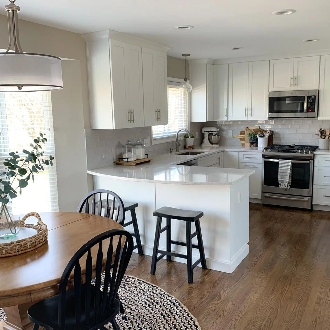 Tranquil White &amp; Wood Peninsula in a U-Shaped Kitchen