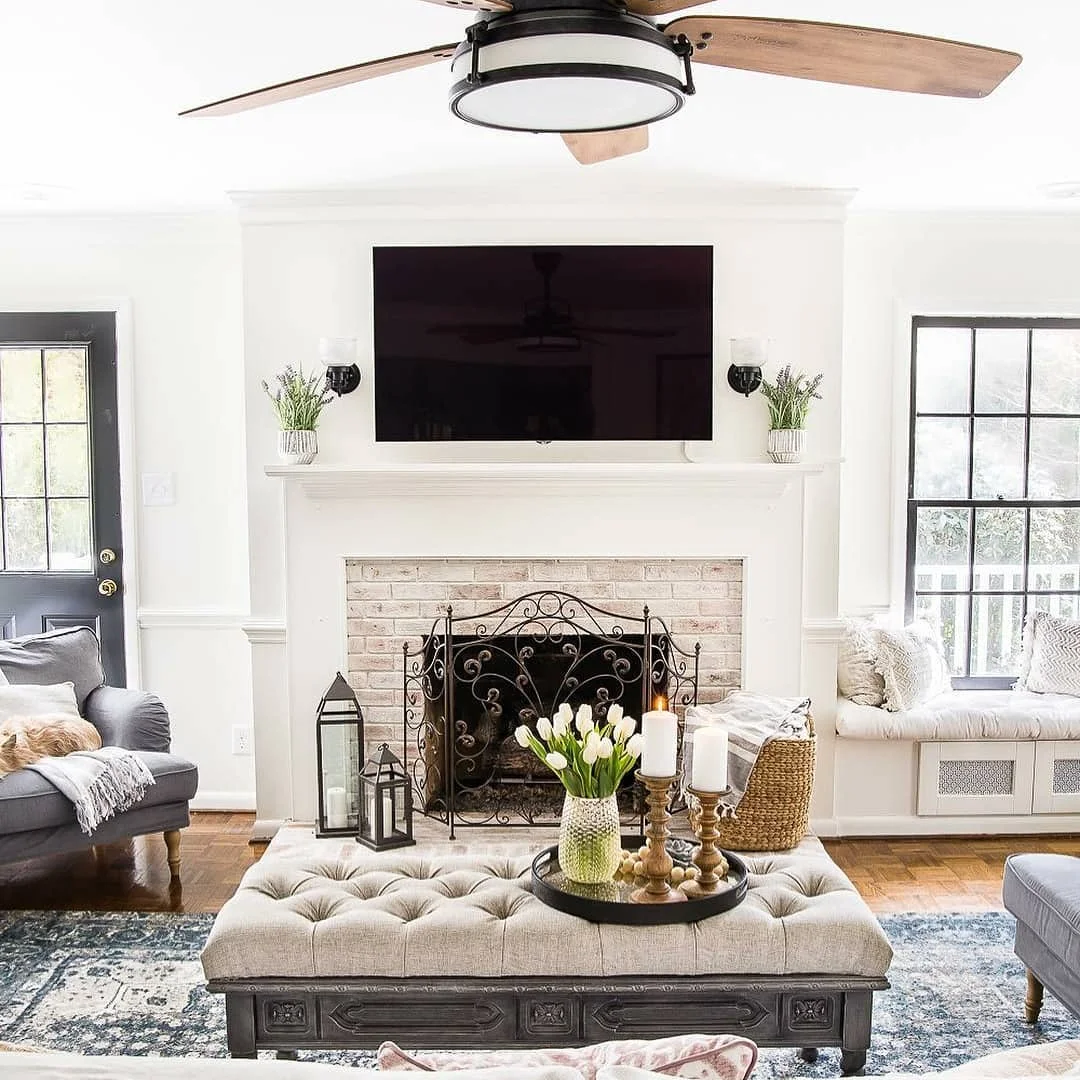 Lime Brick Fireplace with Tufted Ottoman