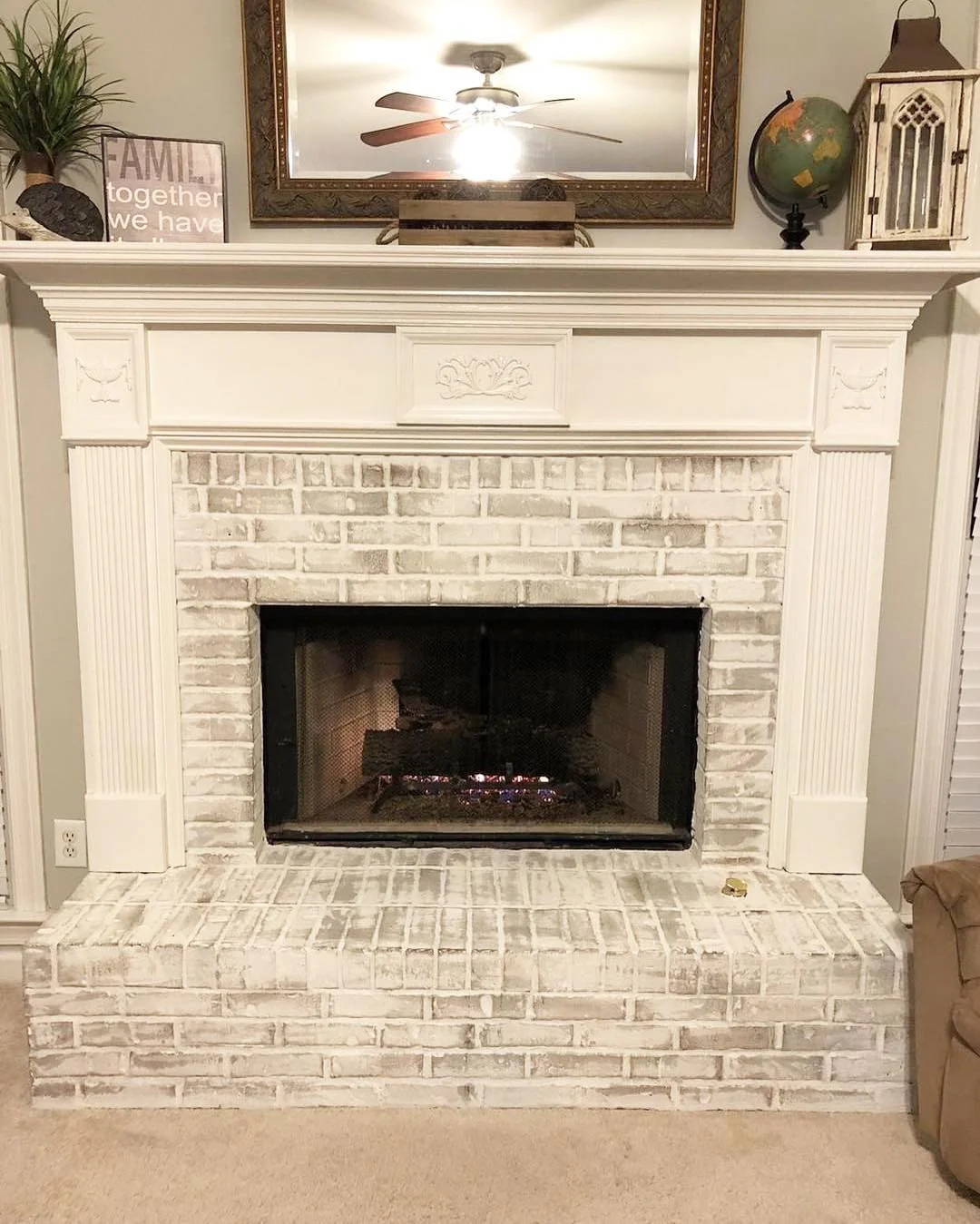 Limewashed Brick Fireplace with Traditional Mantel